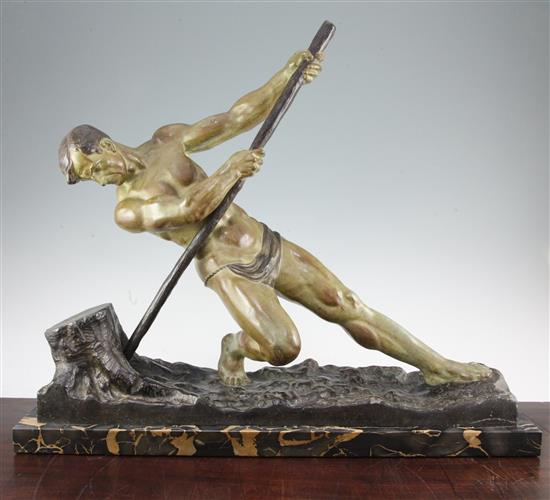 Alexandre Ouline (Belgian). An Art Deco patinated metal figure of a man working a tree stump, 21.25in.